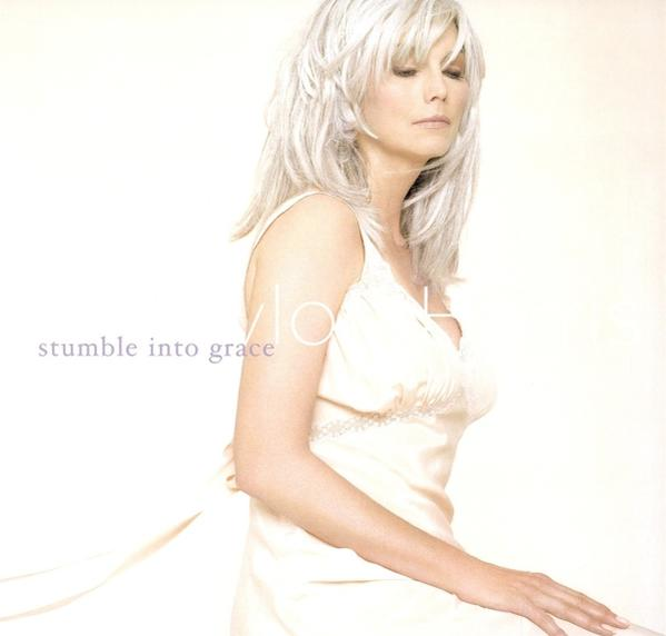 Album borító nővel, hosszú fehér hajjal, világos ruhában. A cím: 'stumble into grace'.