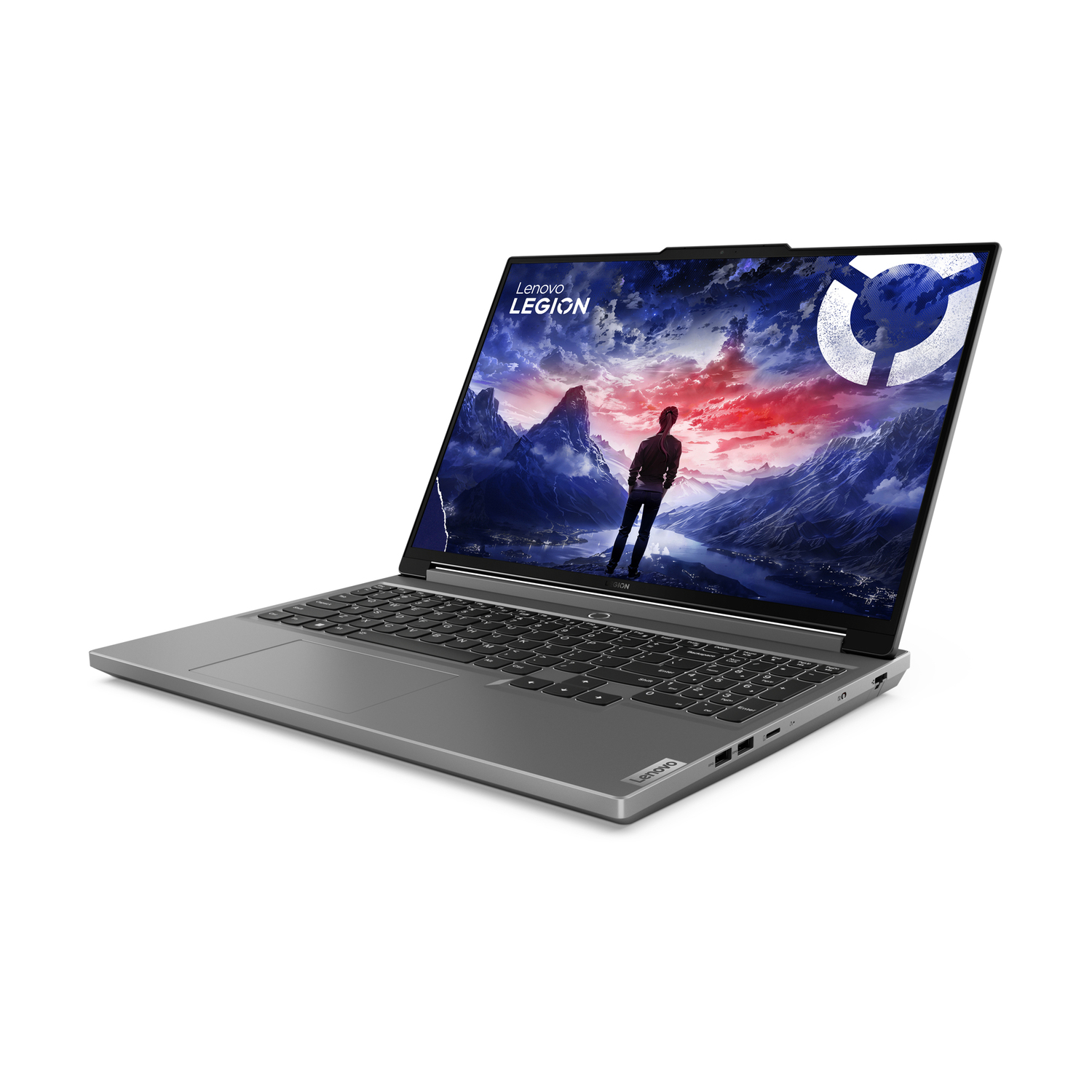 Grijze laptop open, met bergen op het scherm. Toetsenbord zichtbaar. Witte achtergrond.