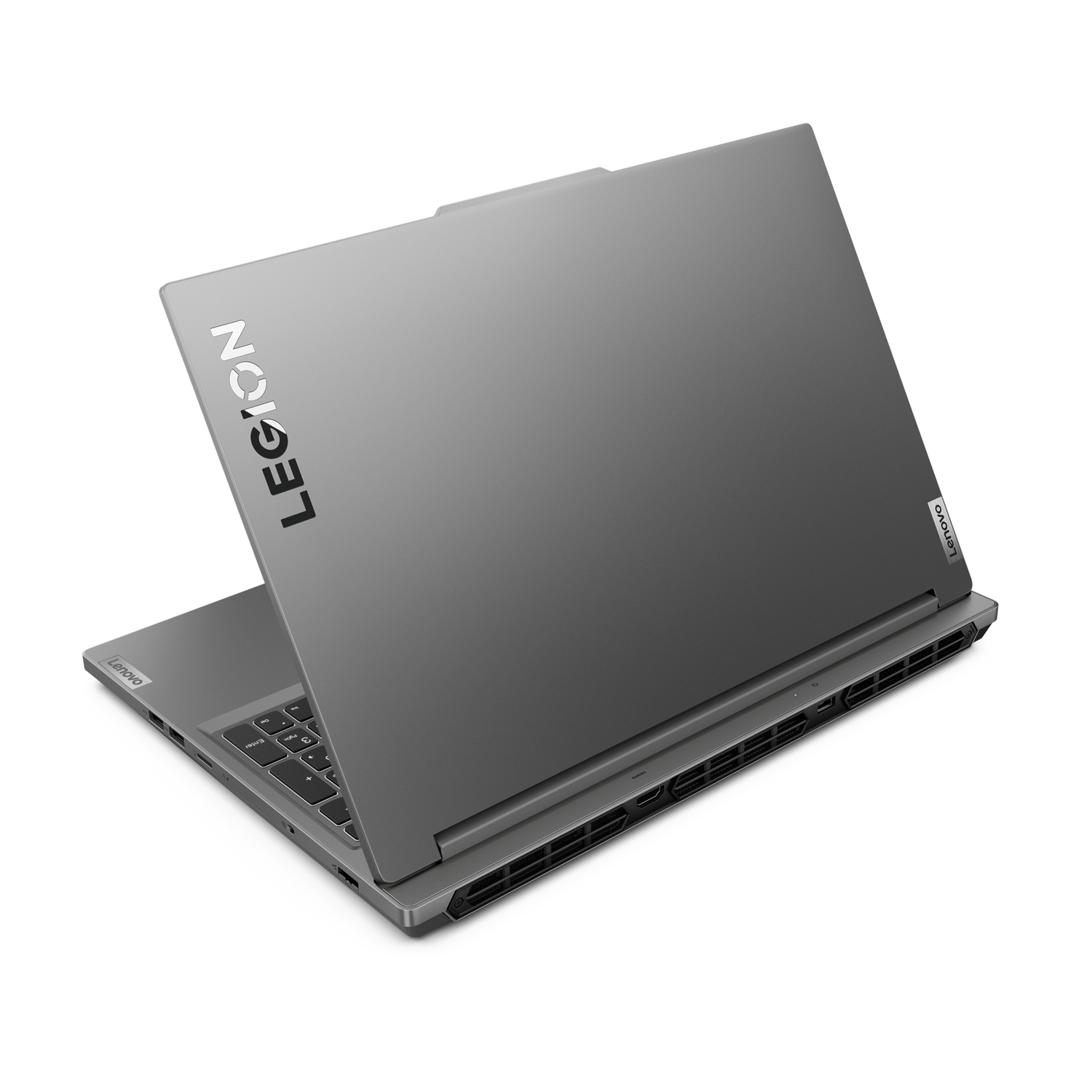 Grijze laptop gesloten, 'LEGION' logo bovenop. Ventilatie achteraan. Witte achtergrond.
