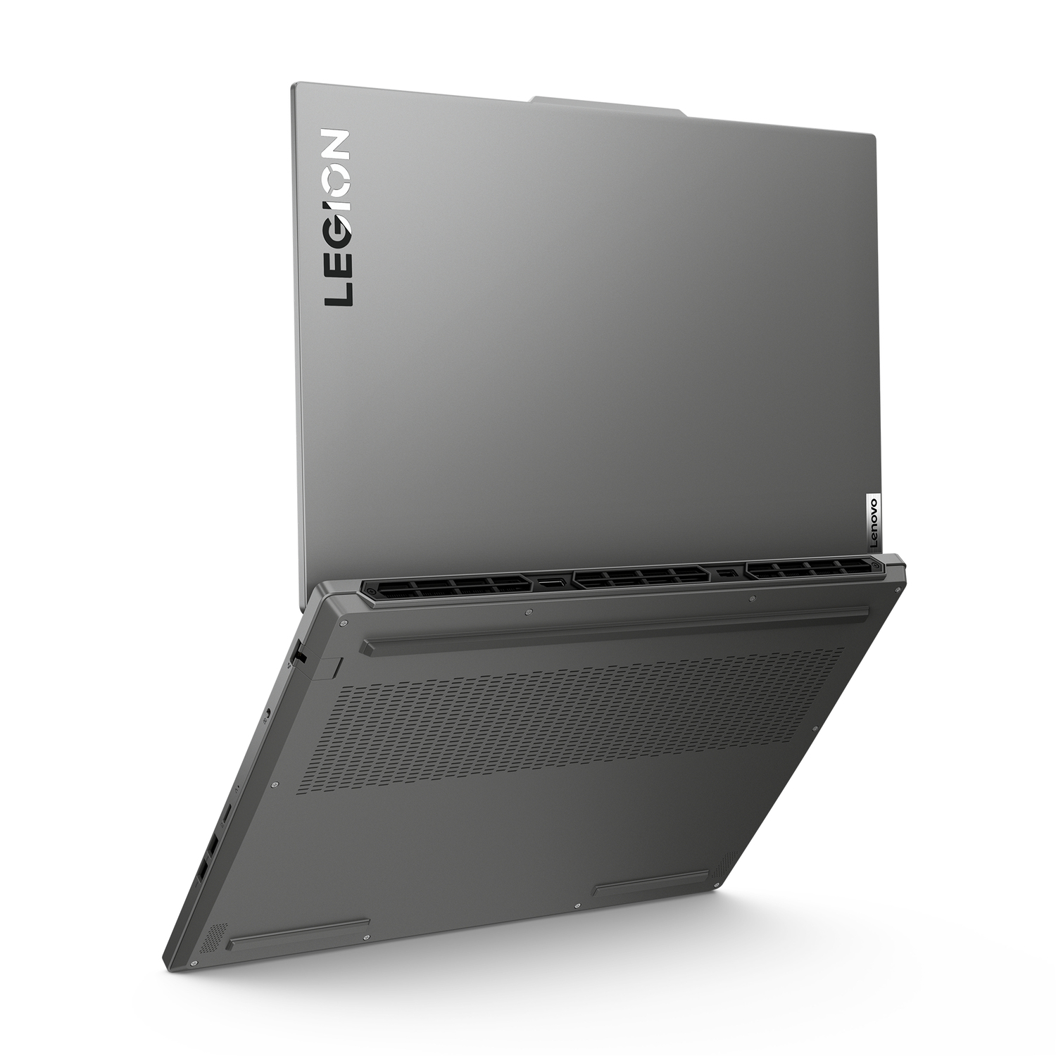 Laptop, grijs, open. 'LEGION' logo op het deksel. Witte achtergrond.