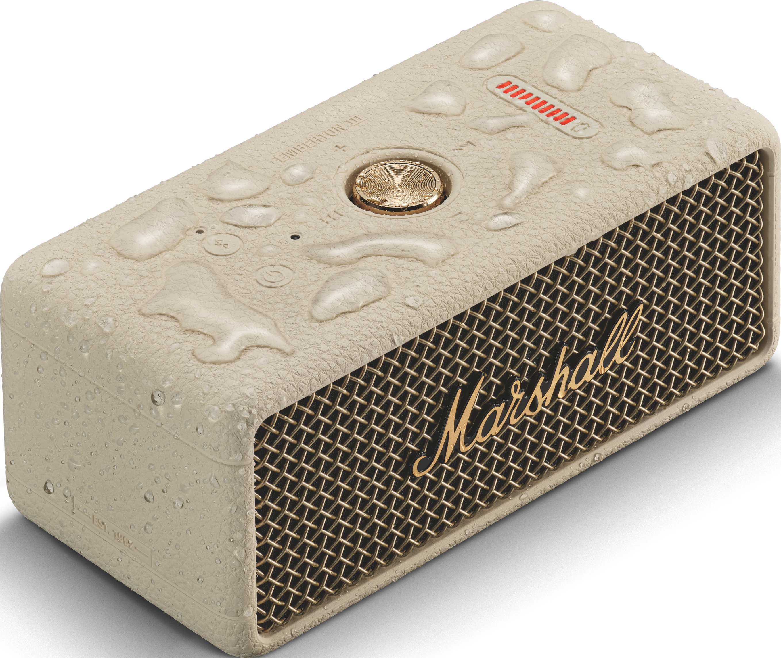 Beiger Marshall-Lautsprecher mit Wassertropfen. Er hat ein goldenes Gitter und einen goldenen Drehknopf.