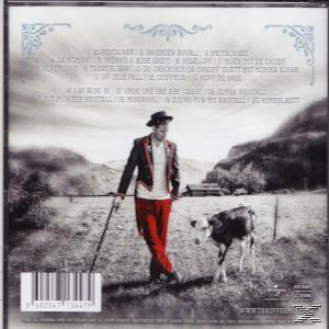 Albumcover mit einem Mann, der mit einer Kuh geht. Der Hintergrund zeigt eine Landschaft.