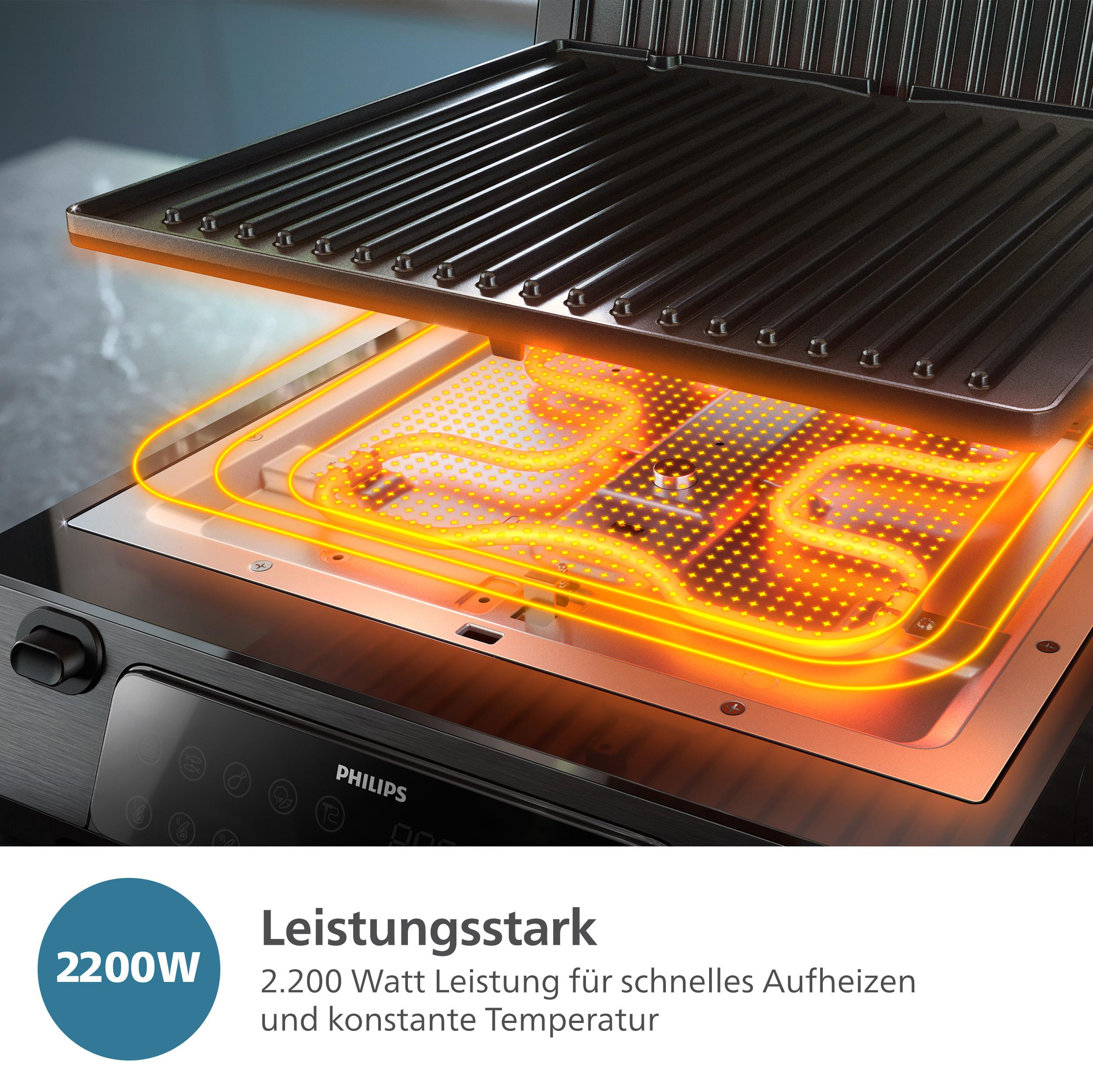 Ein schwarzer und grauer Grill, bei dem das Heizelement sichtbar ist.