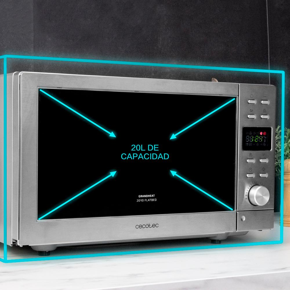 Horno microondas con flechas que indican capacidad 20L, con pantalla digital.