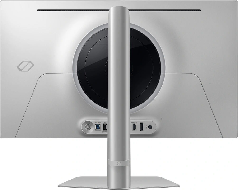 Achteraanzicht van een zilveren monitor. Poorten zichtbaar, met zilveren standaard.