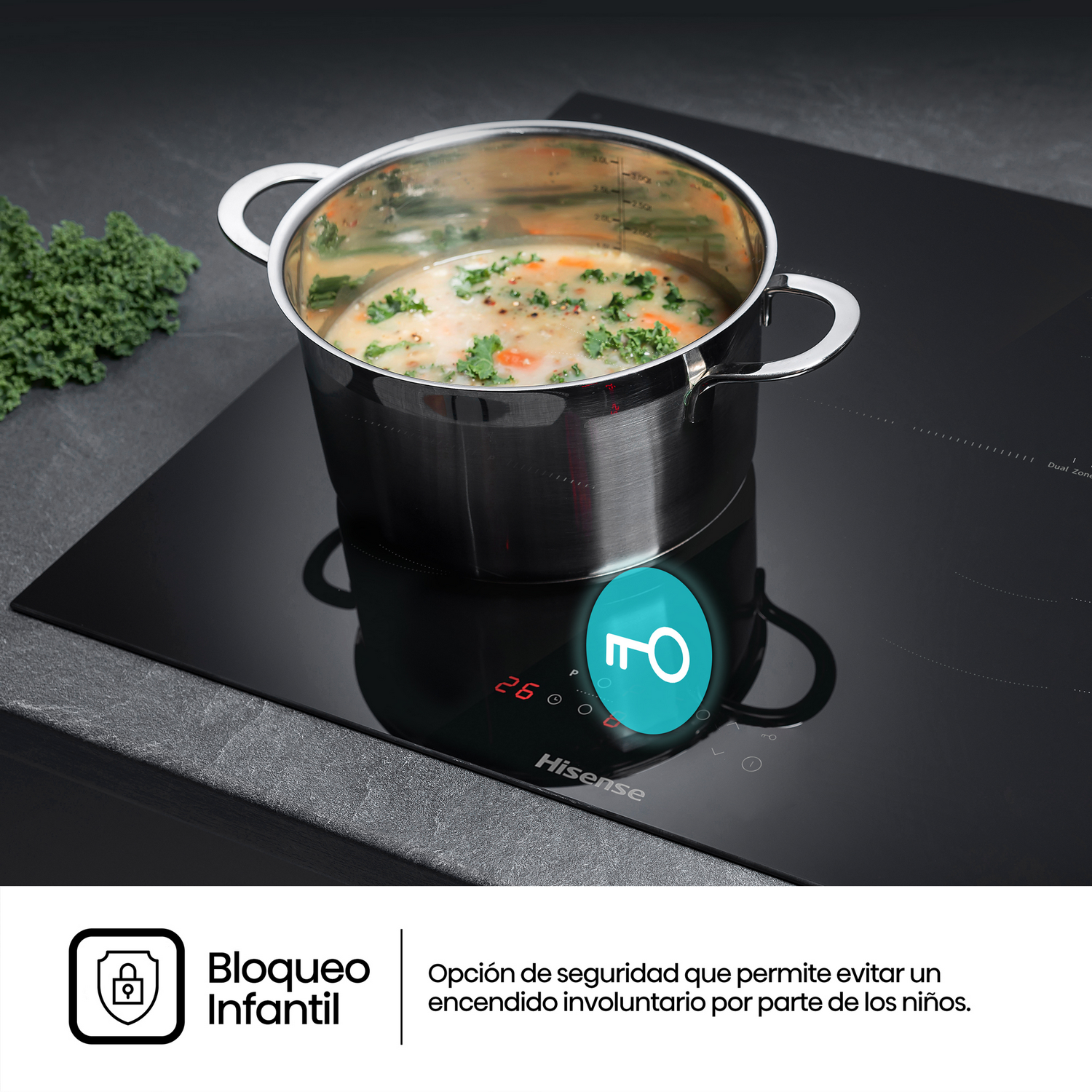 Placa de inducción negra con olla. El icono de la llave muestra la función de bloqueo infantil.