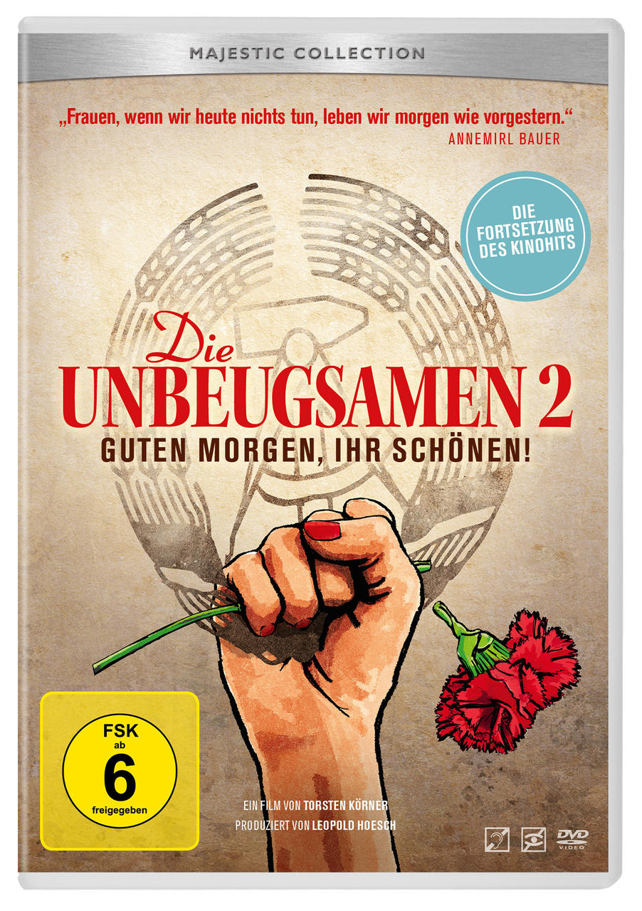 DVD-Cover, eine Hand, die eine Blume hält, eine rote Blume. Der Titel lautet "Die Unbeugsamen 2". FSK 6 Logo.
