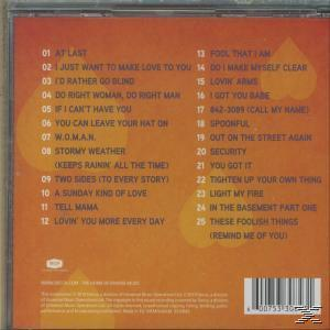CD-Rückseite mit 25 Titeln und Interpreten, mit orange-gelbem Hintergrund.