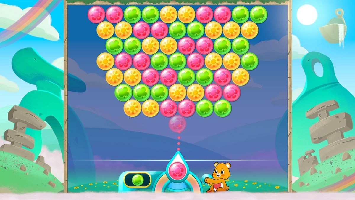 Capture d'écran du jeu Bubble Shooter avec des bulles colorées, un ours et le ciel.