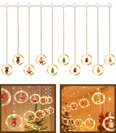 Lampki choinkowe w kształcie kół z dekoracjami, wiszące przed oknem.