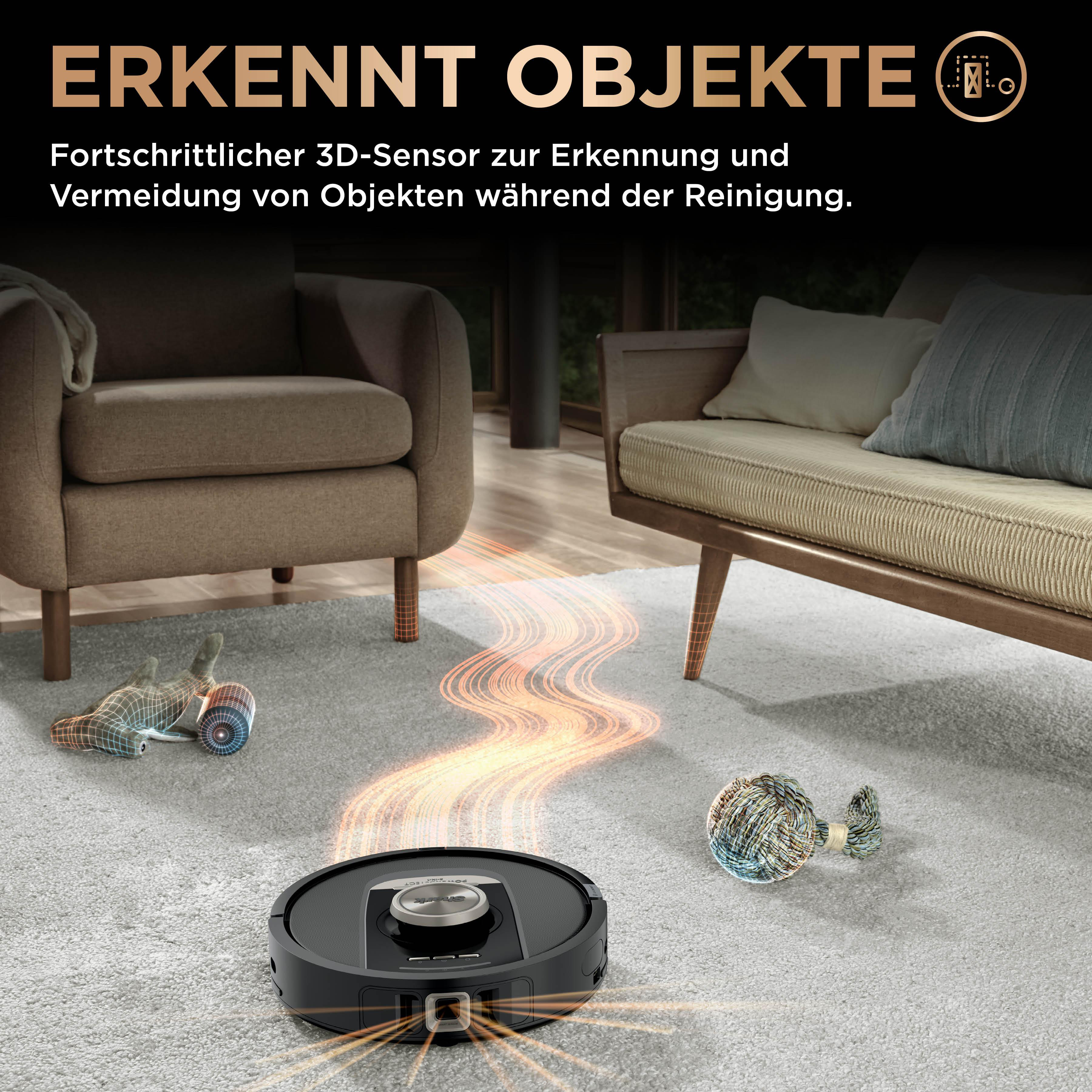Roboter-Staubsauger reinigt einen Teppich, mit Objekten im Vorder- und Hintergrund.