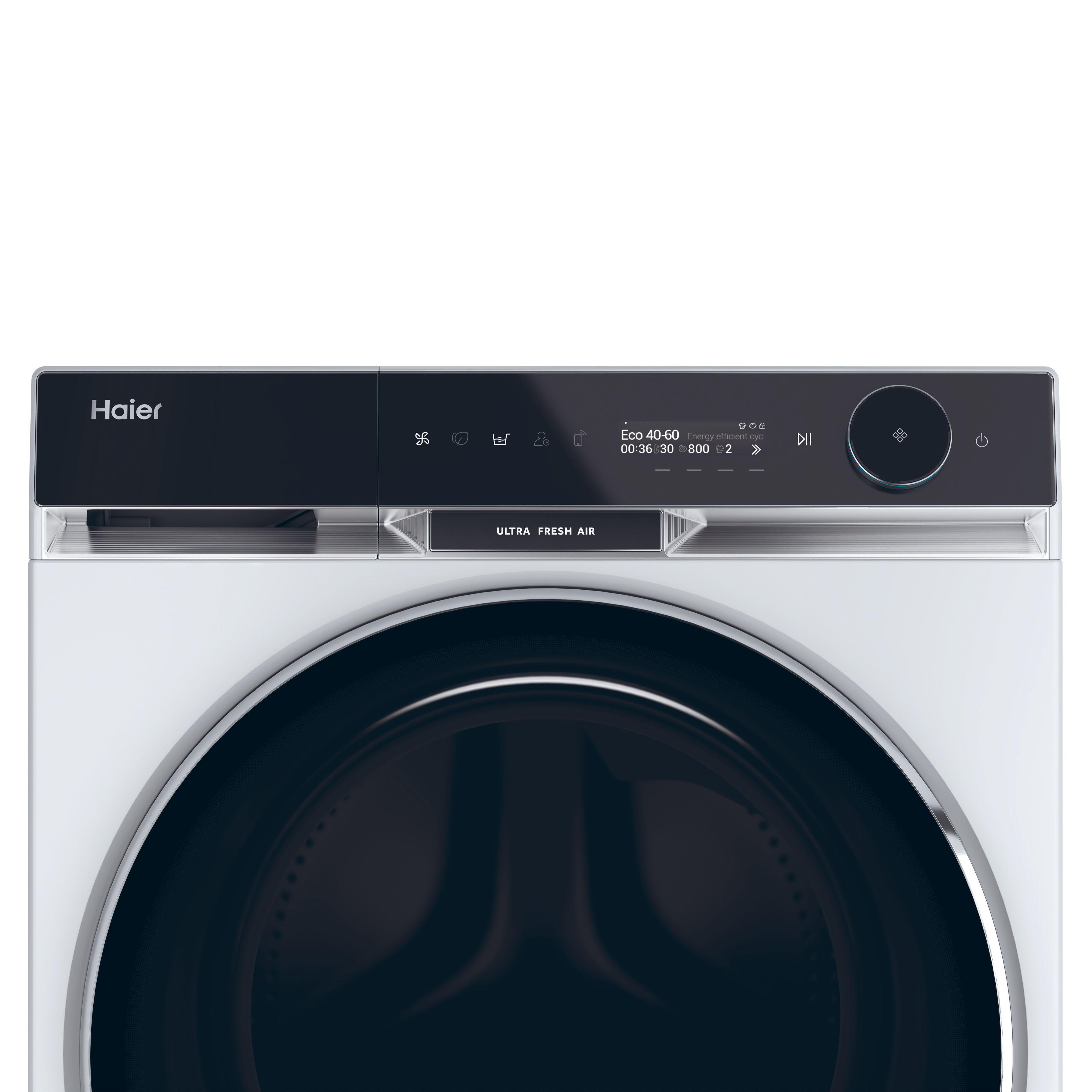 Nahaufnahme des Bedienfelds einer Haier Waschmaschine, weißer Hintergrund.