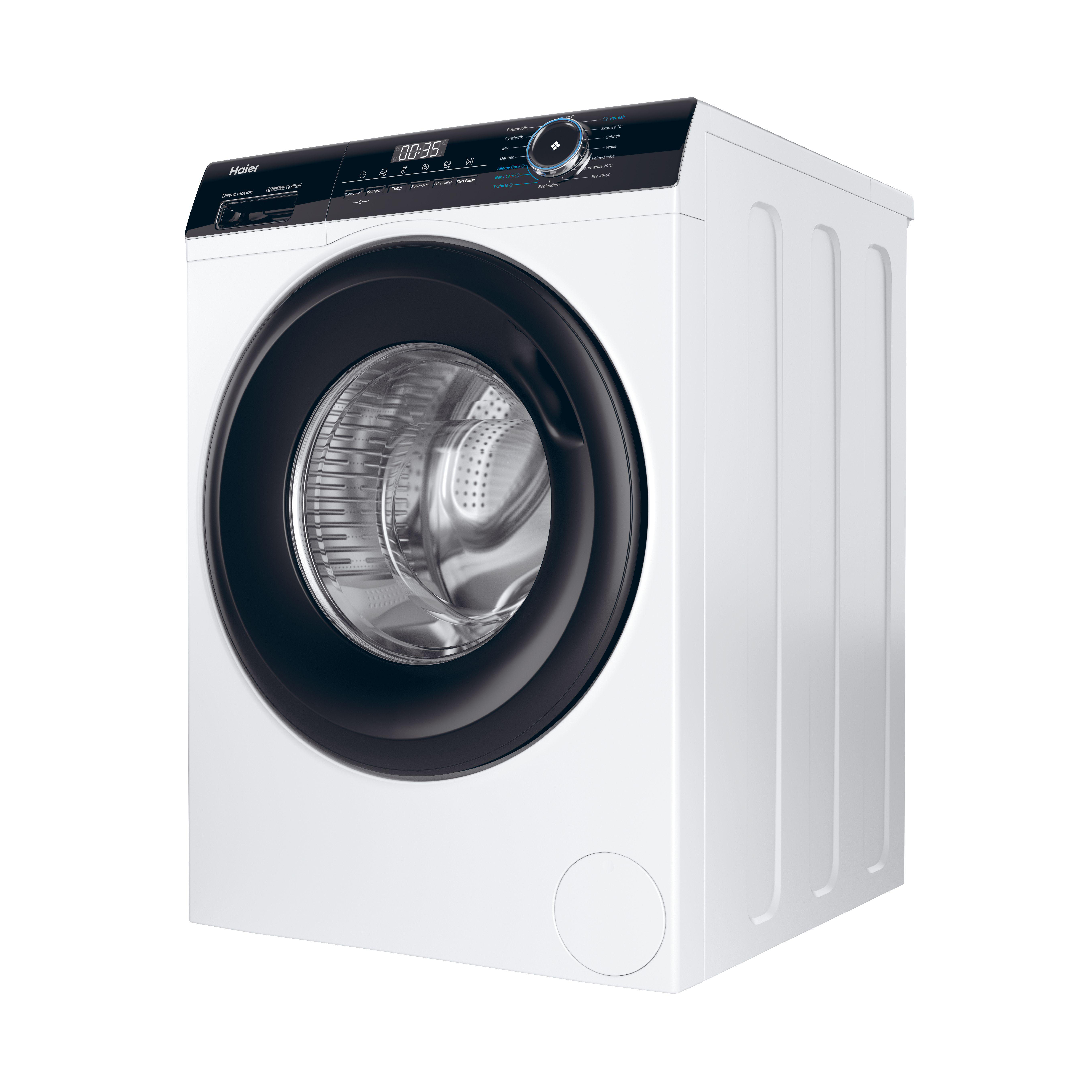 Eine weiße Haier Waschmaschine mit geschlossener Tür.