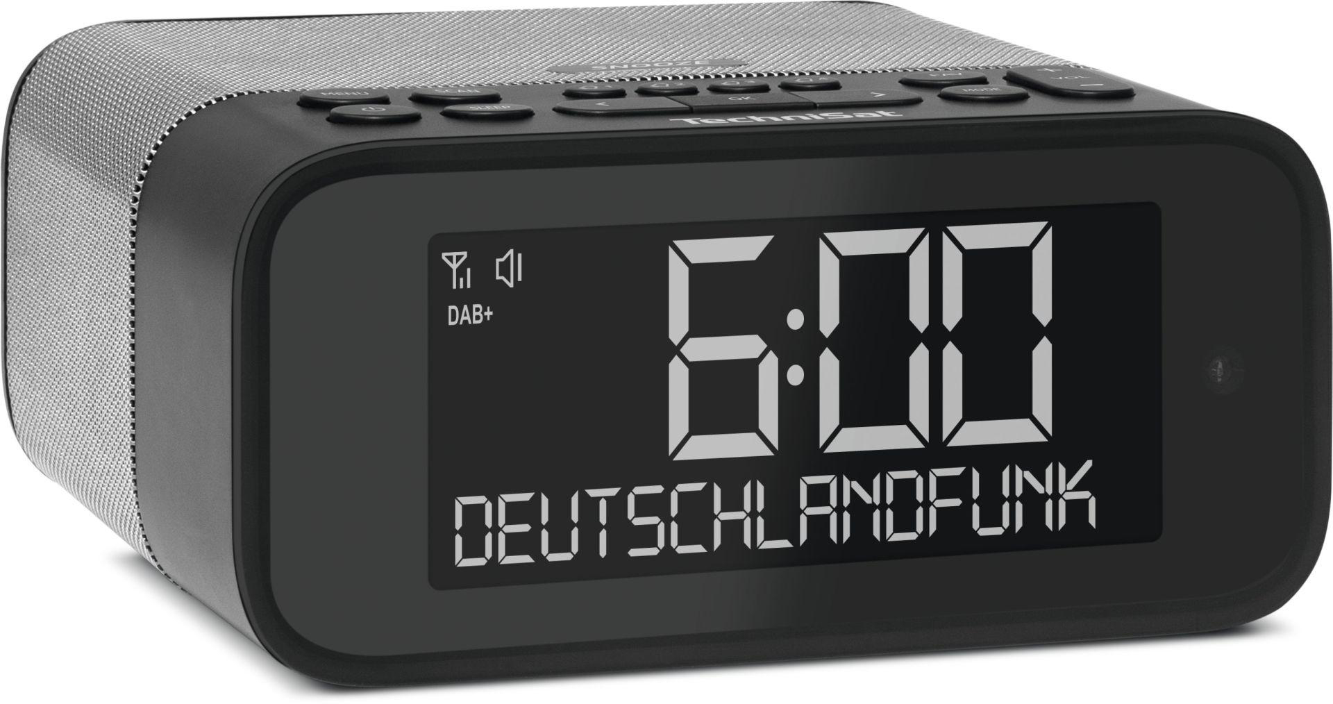 Ein schwarzer digitaler Radio-Wecker mit Bildschirm.