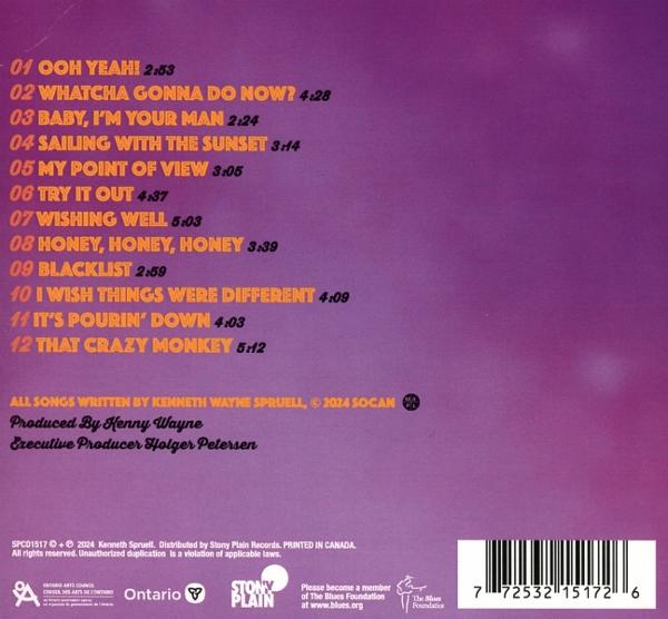 Albumcover mit Songtiteln und Text. Ein verschwommener Hintergrund.