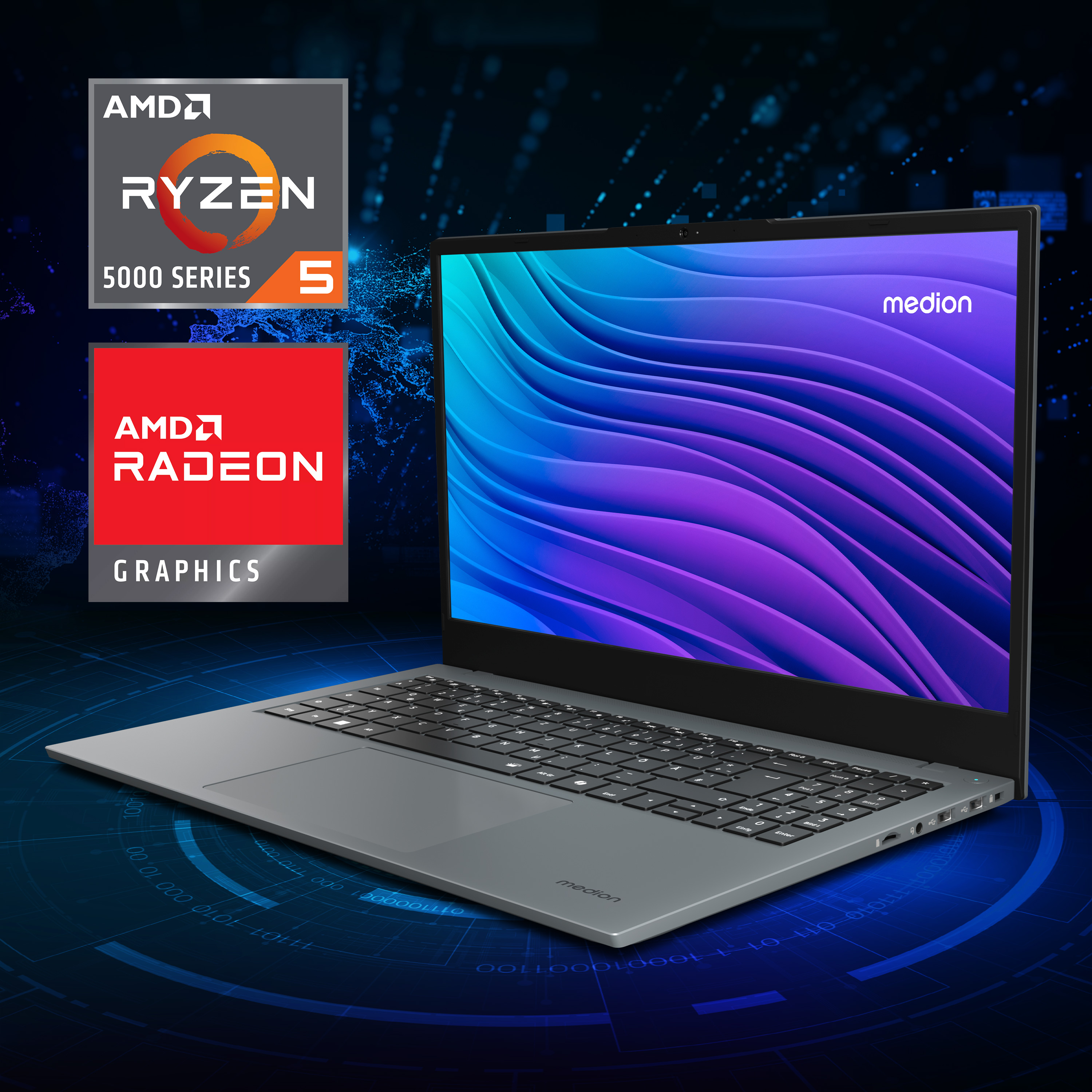 Laptop, AMD Ryzen 5 und Radeon Grafik gezeigt. Der Laptop ist grau, Bildschirm blau und lila.