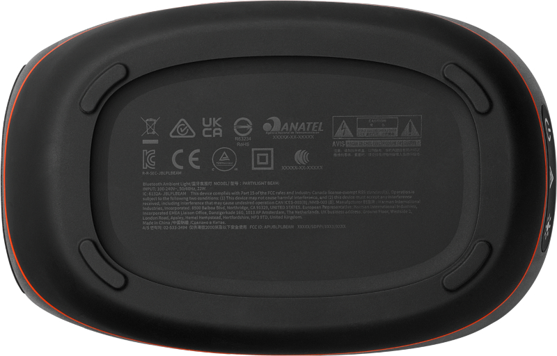 Die Unterseite eines schwarzen Lautsprechers mit orangefarbenen Akzenten.