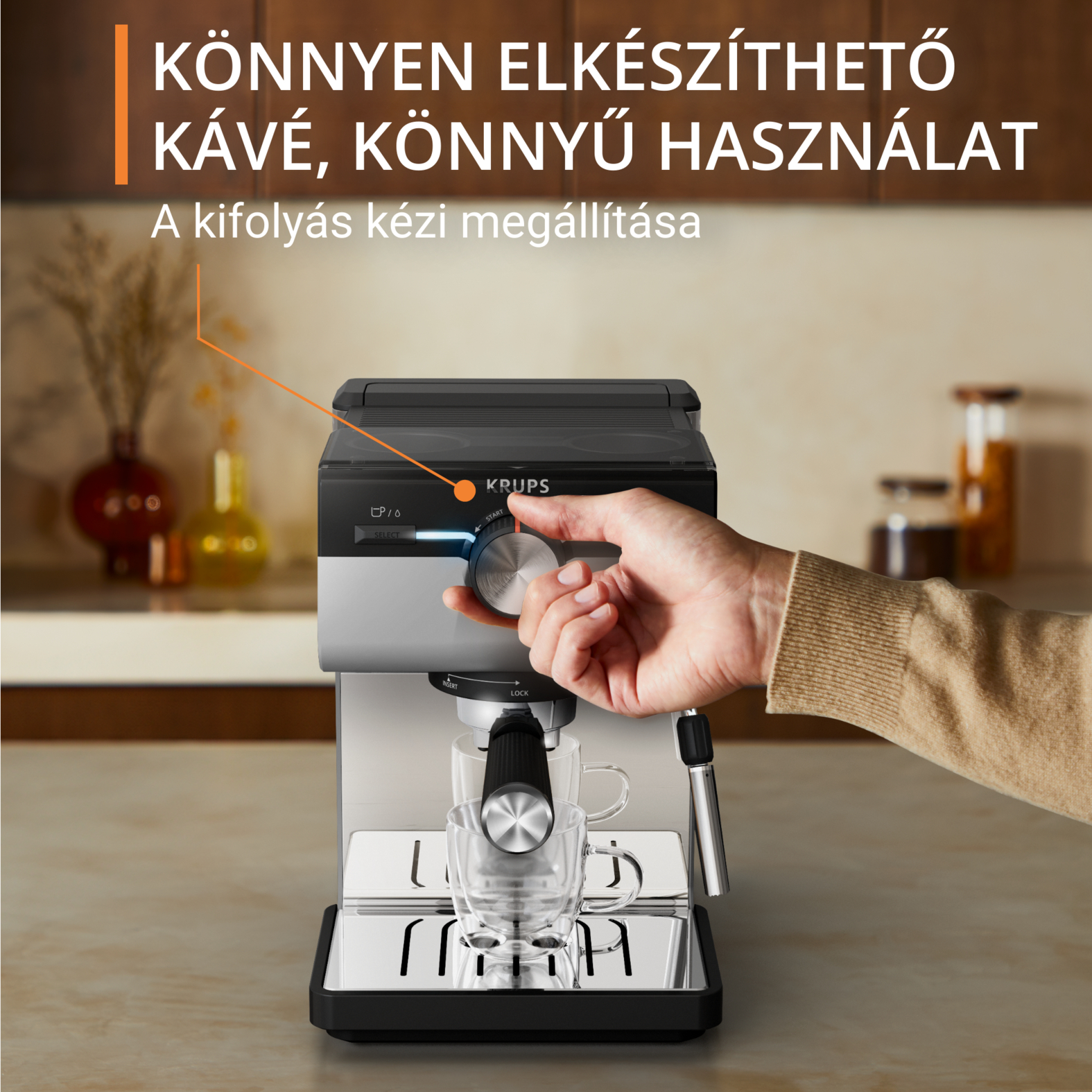 Egy személy keze egy eszpresszógép tárcsáját forgatja. Szöveg: Könnyen elkészíthető kávé. Könnyen használható.