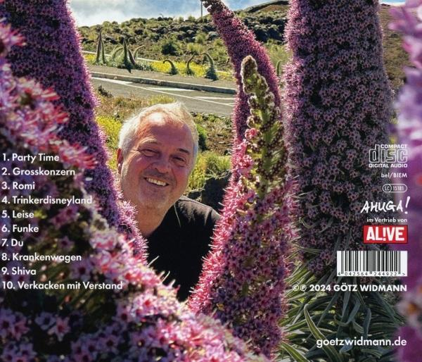 Albumcover mit lächelndem Mann, umgeben von lila Blumen und einer Liste von Titeln.