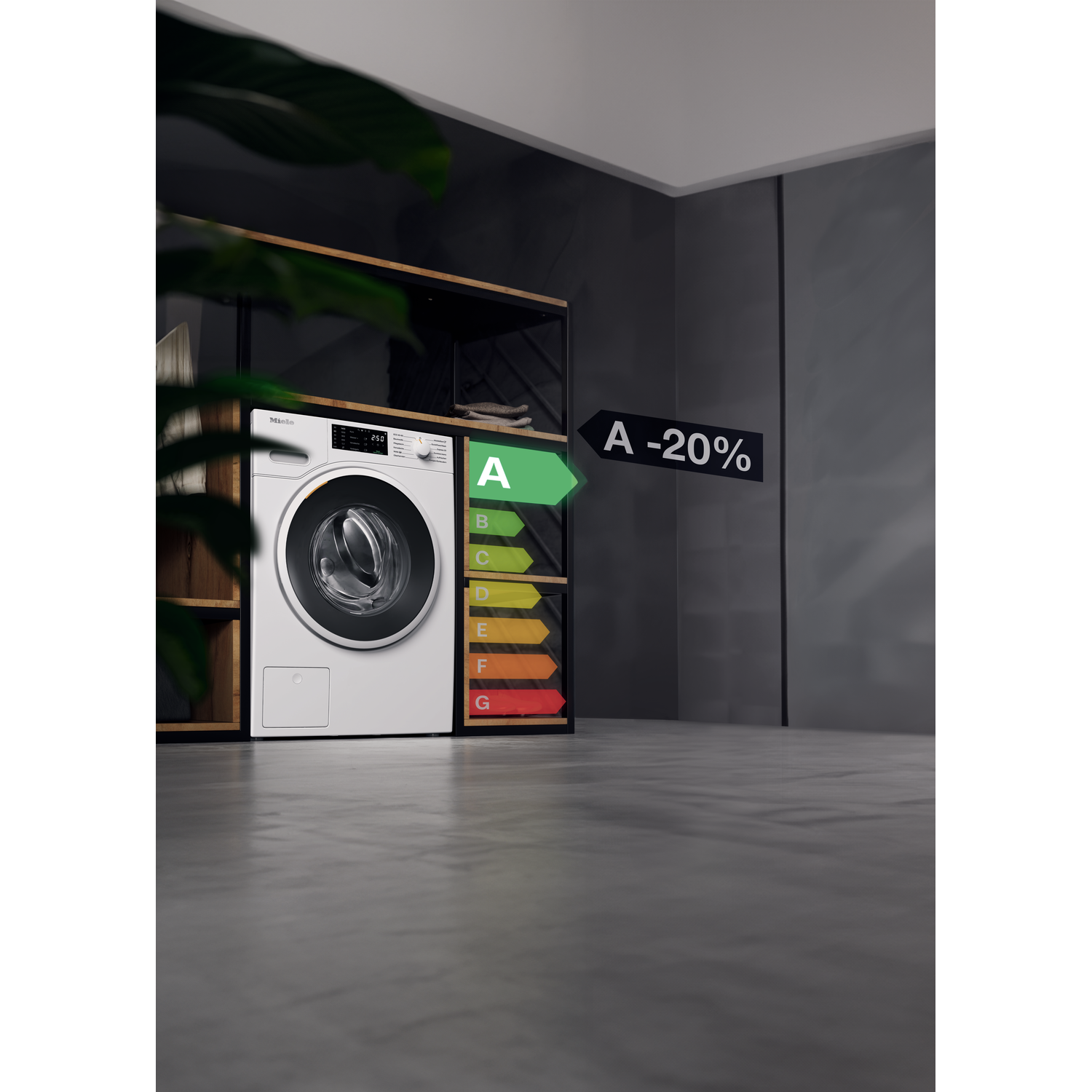 A white Miele washing machine, energy label A, in a gray room. Shelf with items on the left.