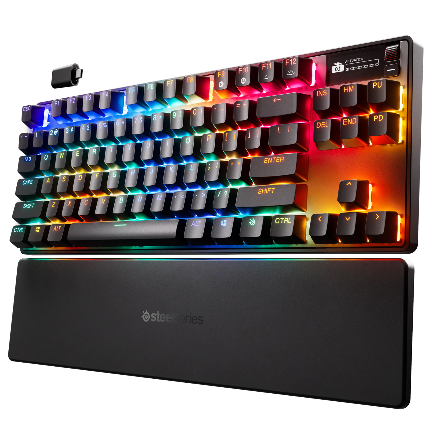 Keyboard with a wrist rest, and colorful backlit keys, with a black cable, white background.