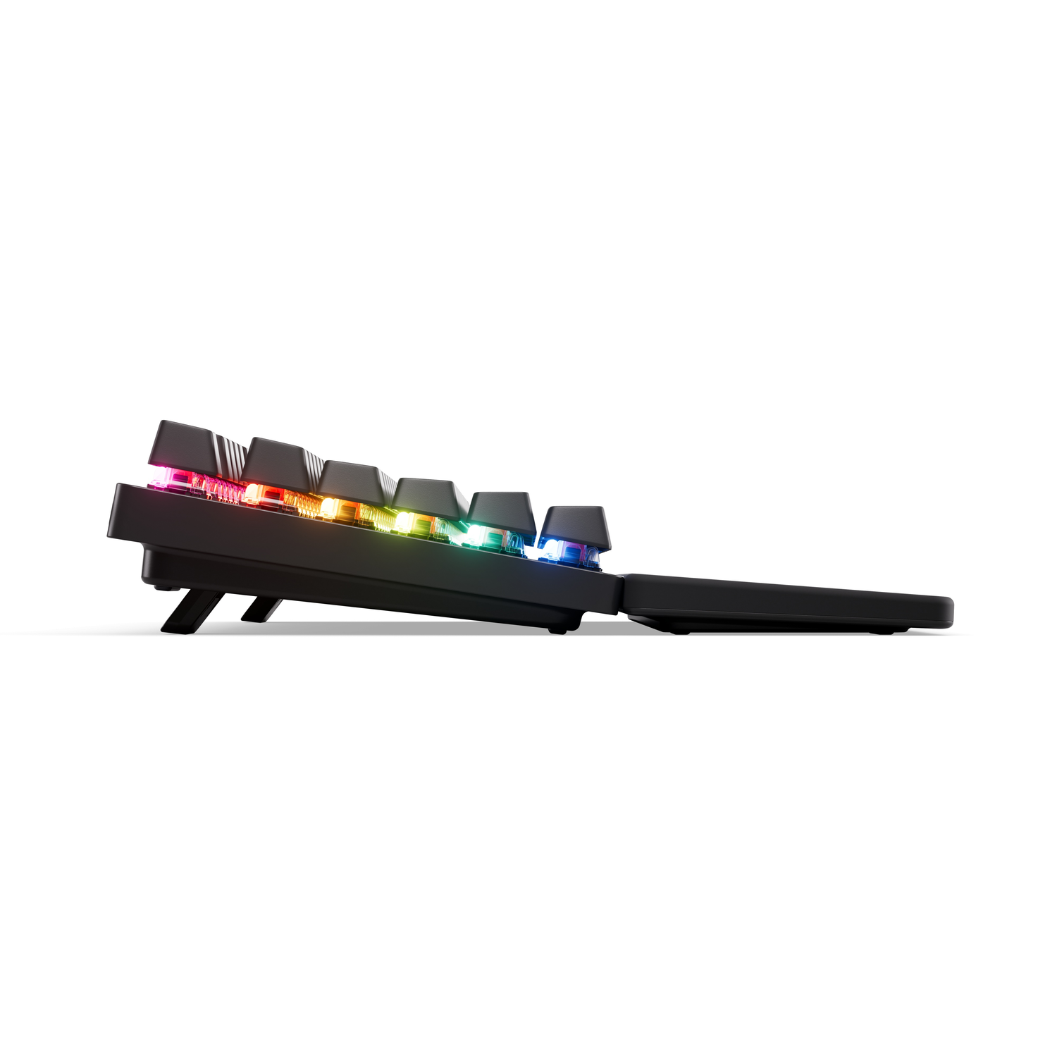 Side view of a black mechanical keyboard, keys illuminated with rainbow lights.