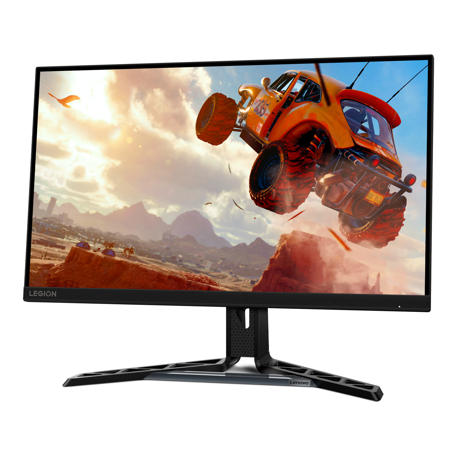Lenovo Legion monitor displays a car racing on a track. The car is orange, and the background is a sunset.
