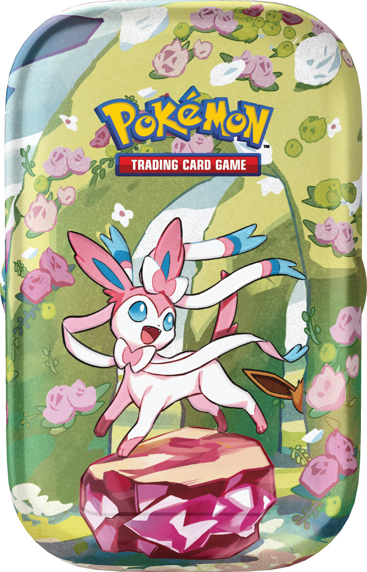 Ein rosa Pokémon mit langen Bändern steht auf einem rosa Kristall vor einer Blumenwiese.
