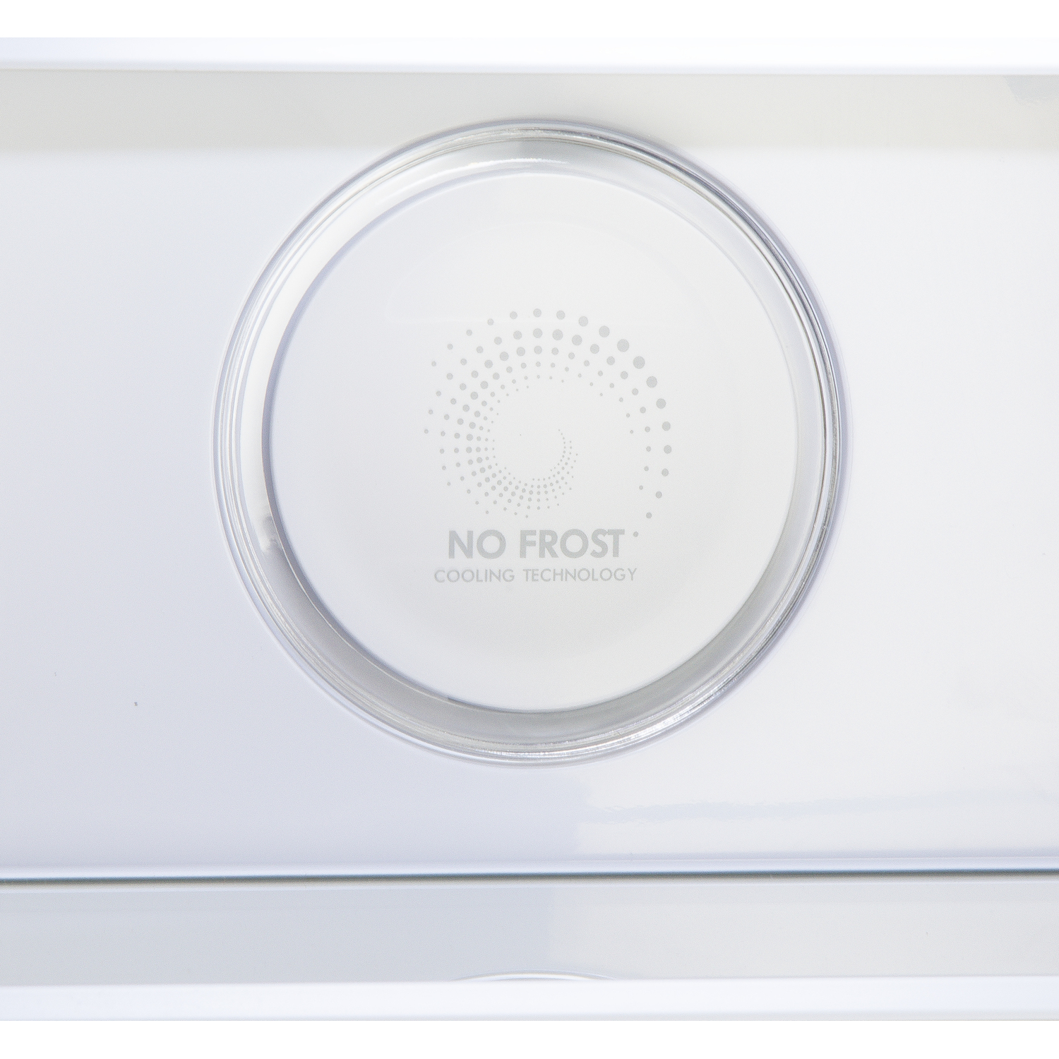 Close-up of a white panel with a circular, transparent design and the words "NO FROST" and "COOLING TECHNOLOGY".