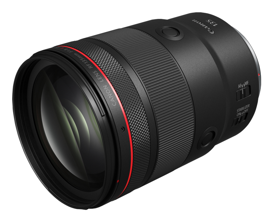 Schwarzes Canon-Objektiv mit rotem Ring. Objektivdeckel ist abgenommen. Bedienelemente für AF/MF und Stabilisator.