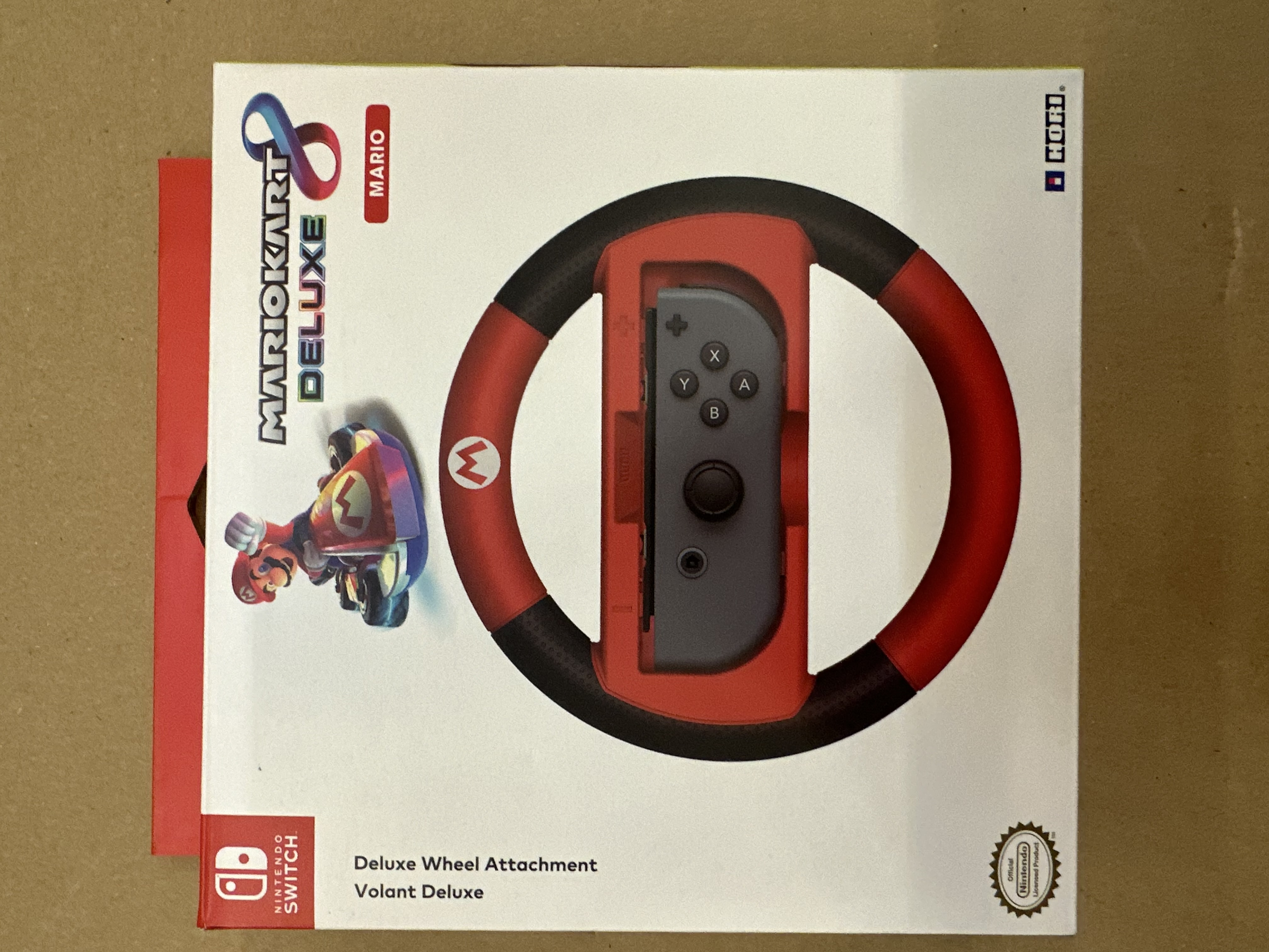 Czerwono-czarne mocowanie kierownicy Mario Kart.