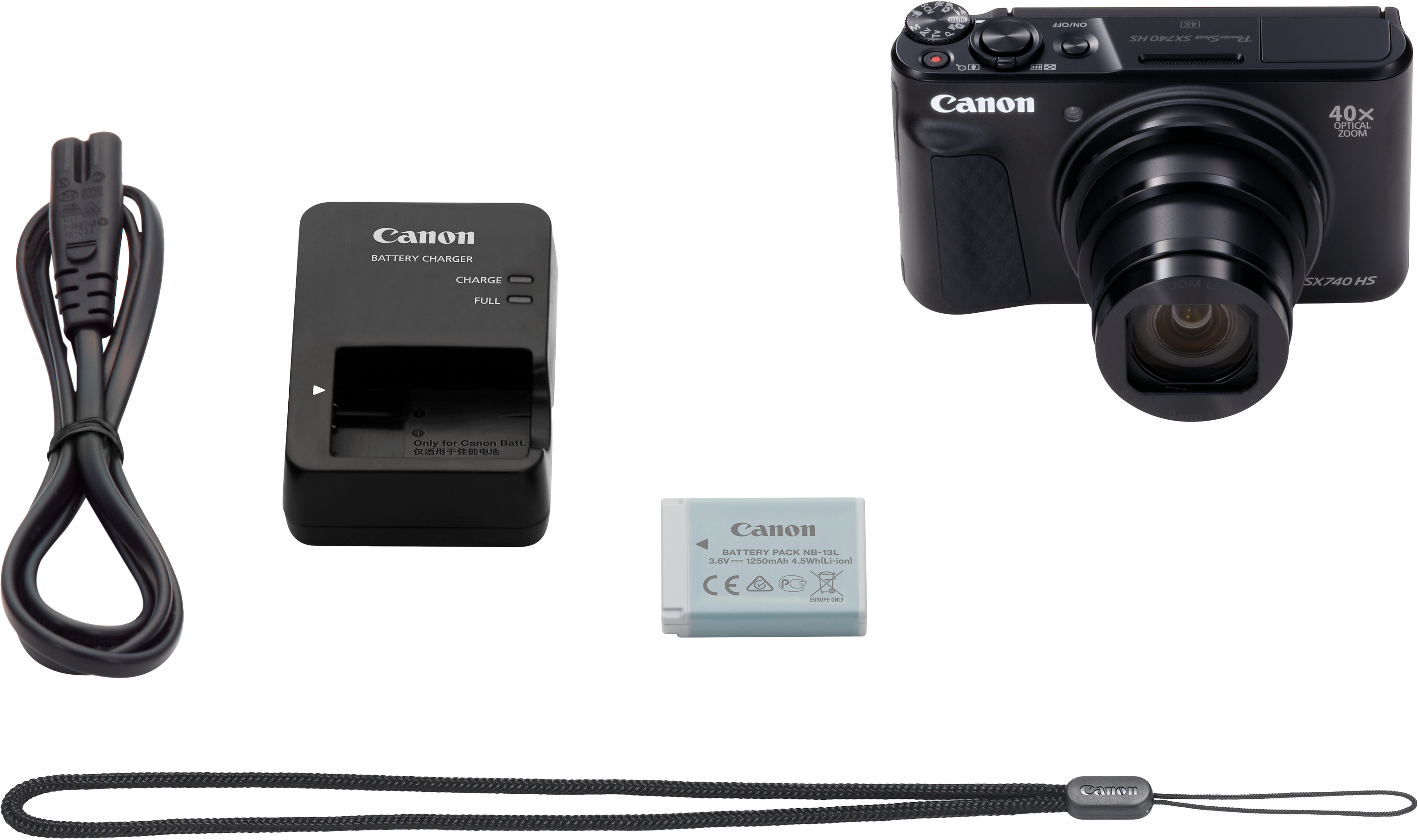 Un kit fotocamera Canon con fotocamera, caricabatterie, batteria, cavo alimentazione e cinturino. Su sfondo nero.