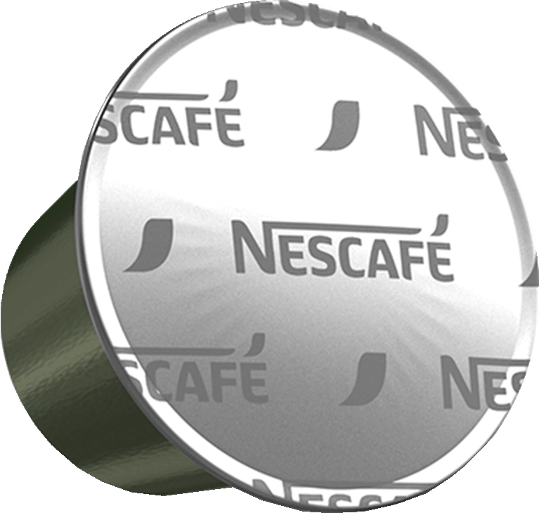 Capsule de café avec logo Nescafe et bord vert.