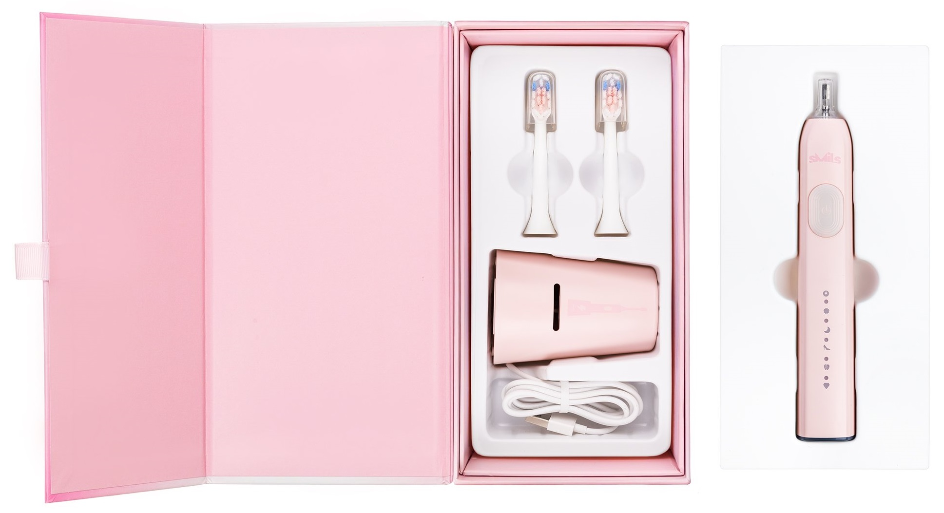 Różowy zestaw szczoteczki do zębów w pudełku. Zawiera końcówki, ładowarkę i szczoteczkę.