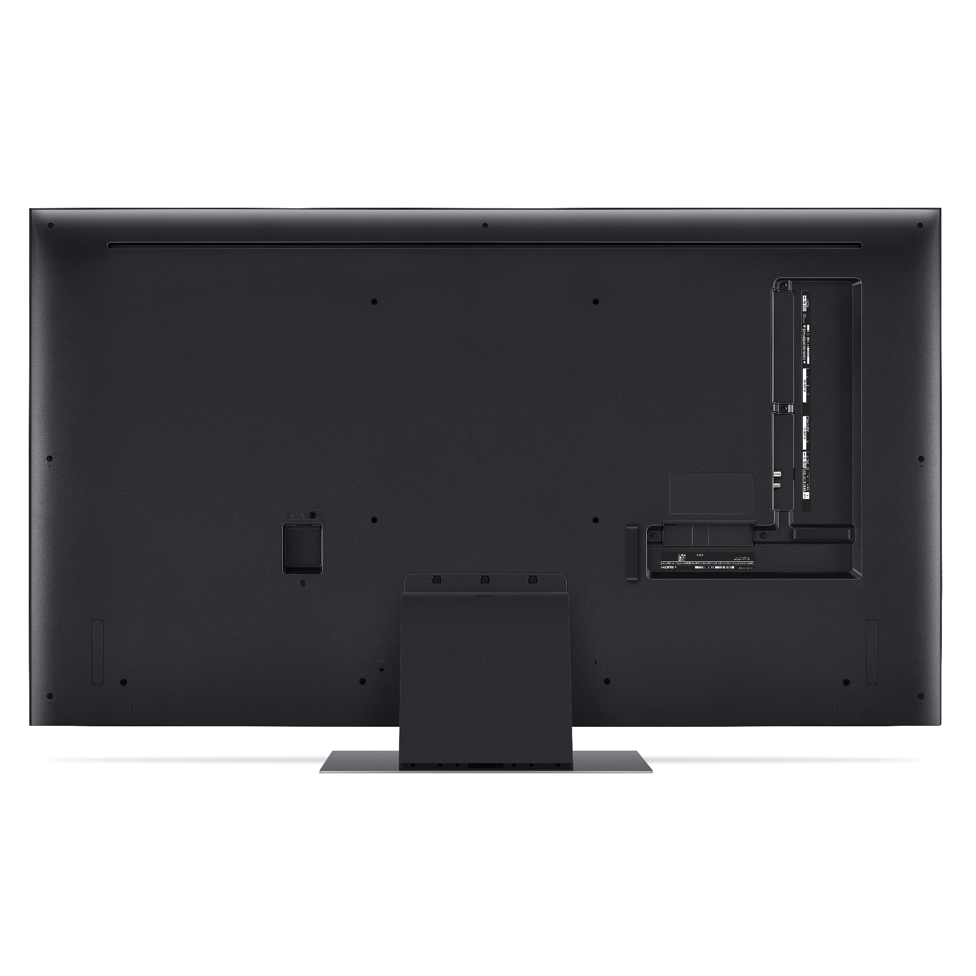 Vista trasera de un televisor negro grande con puertos y un soporte, sobre un fondo blanco.