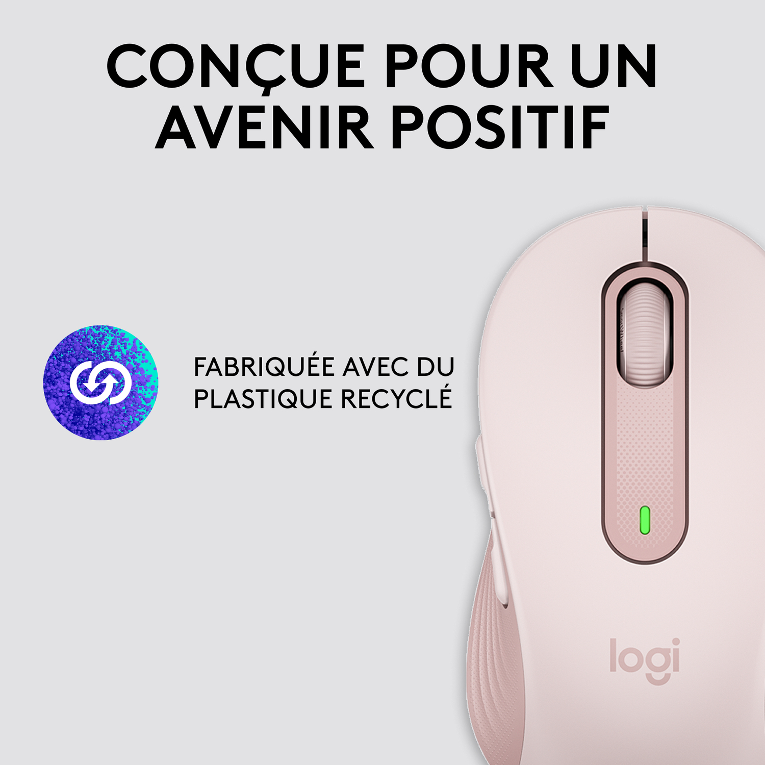 Souris rose avec symbole de plastique recyclé. Texte: Fabriqué avec du plastique recyclé.