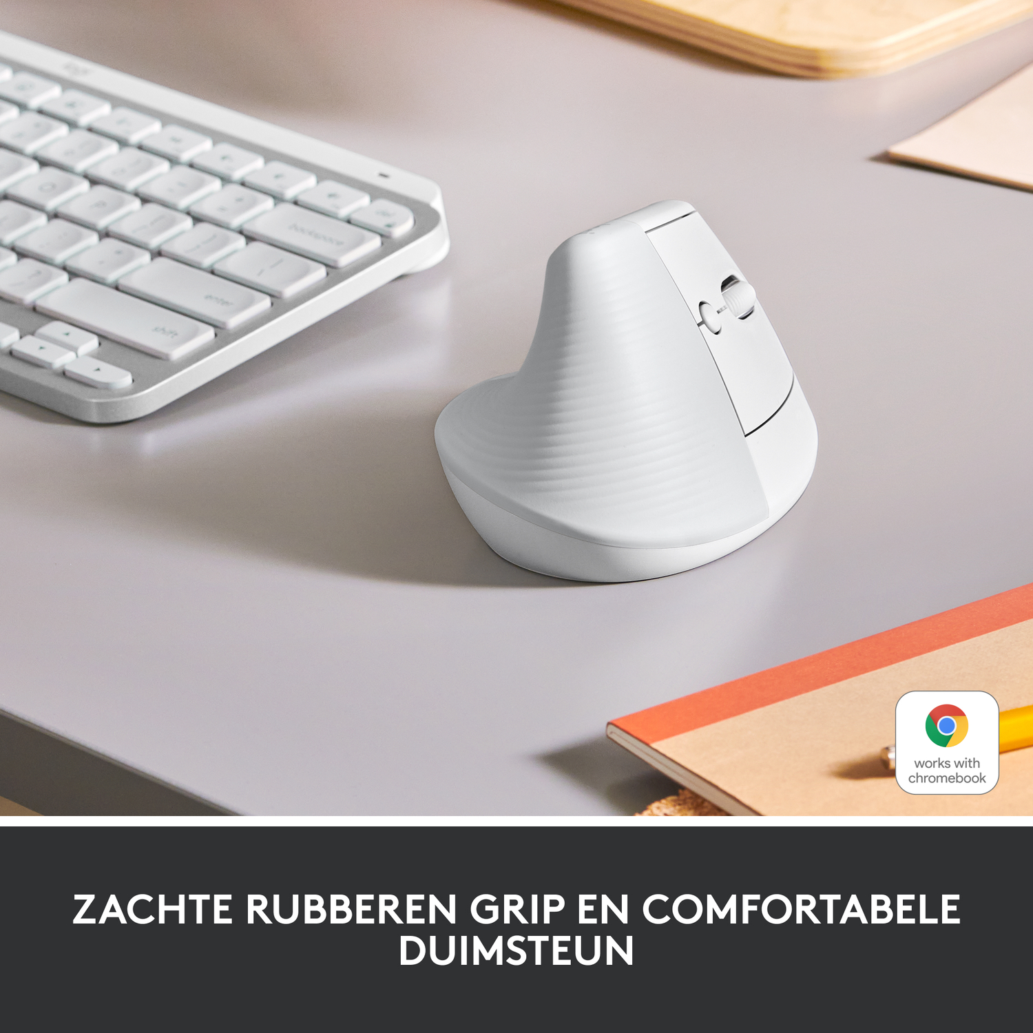 White mouse on a desk with a keyboard and a notepad. Text: Soft rubber grip and comfortable thumb rest.