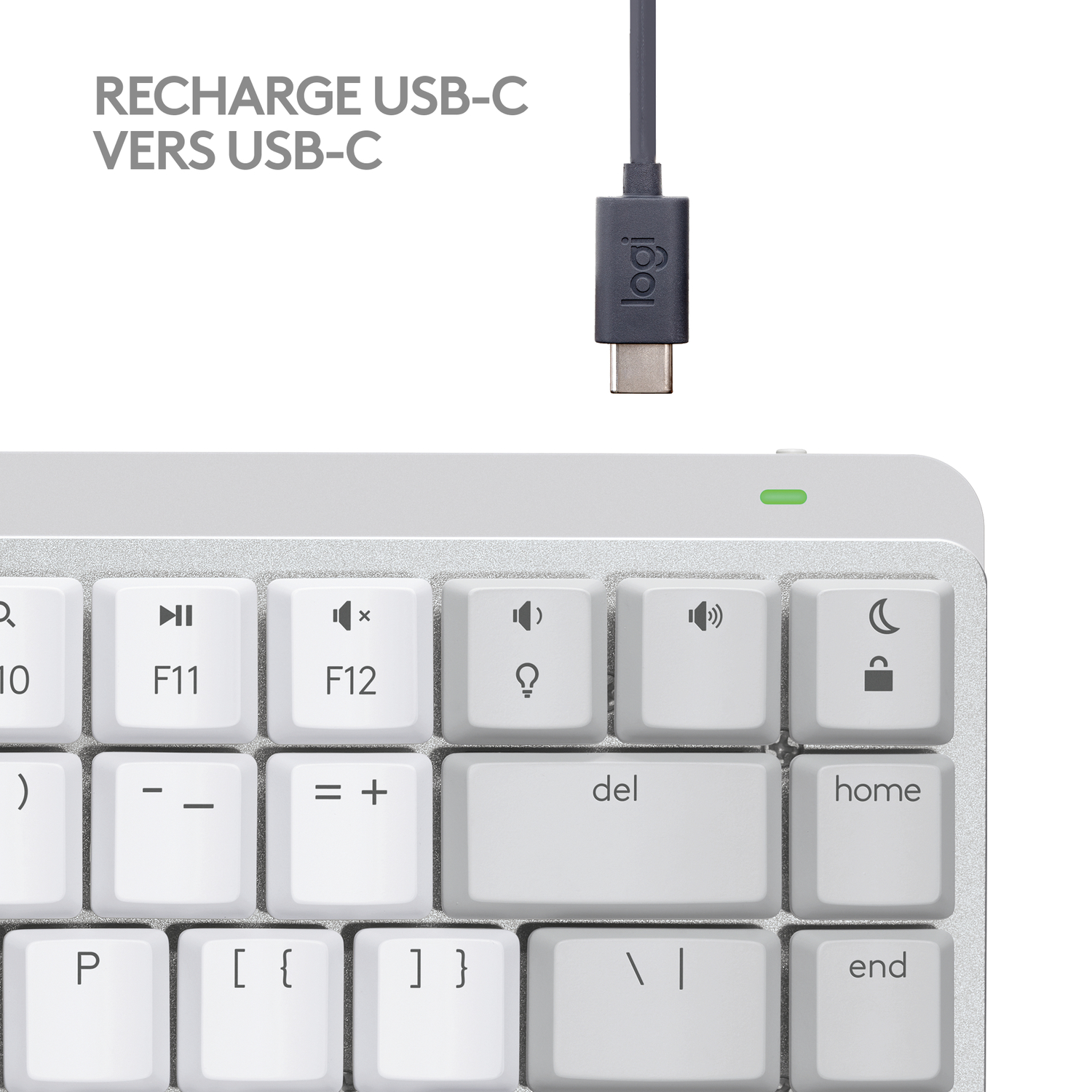 Clavier avec câble USB-C pour la recharge en haut.