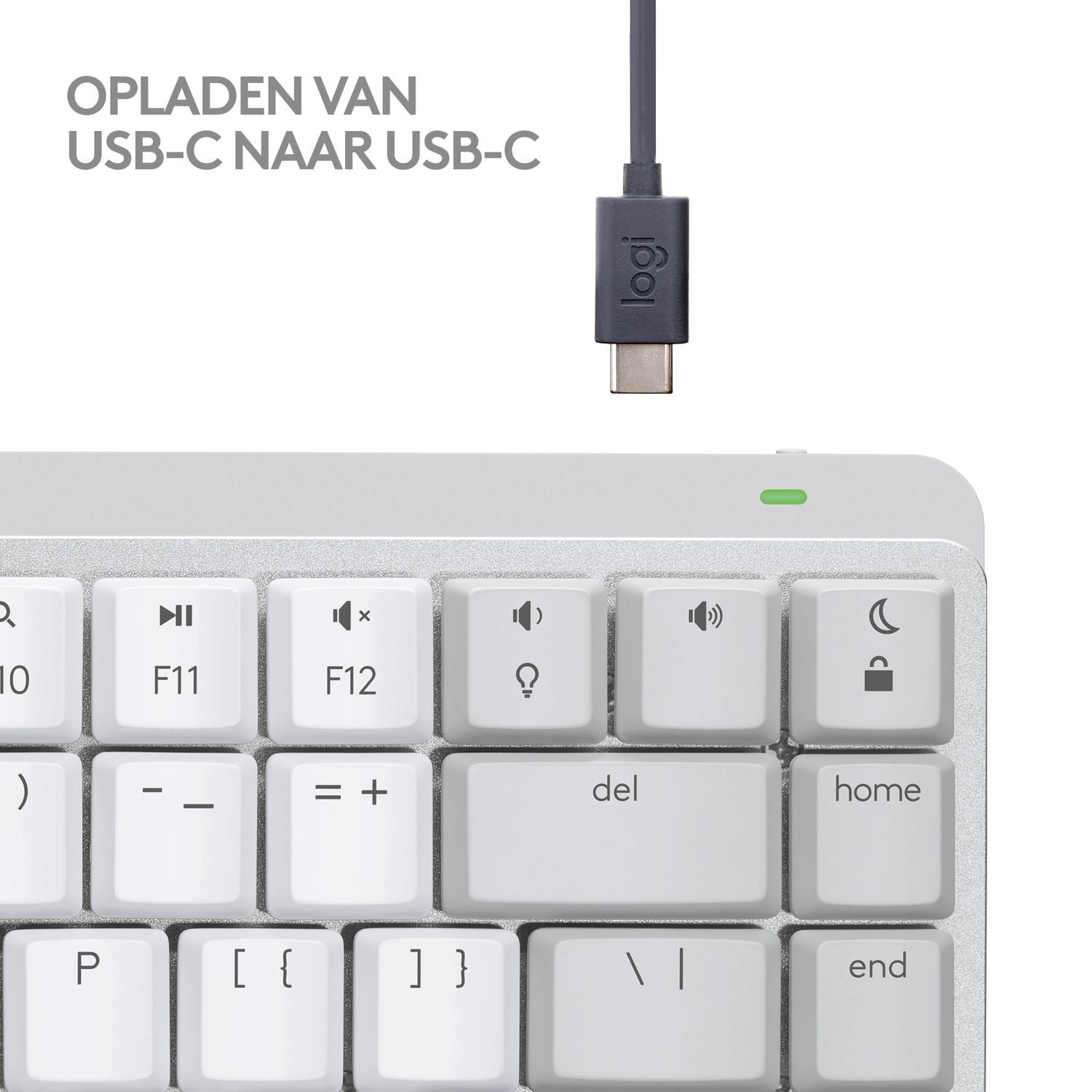 Wit toetsenbord met toetsen en een USB-C-kabel. De kabel is aangesloten op het toetsenbord.