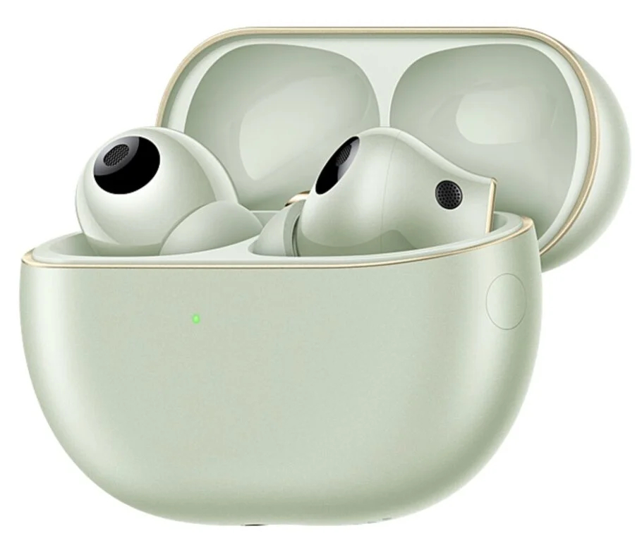 Dziewczyna budująca robota z klocków LEGO, z tabletem i instrukcjami w pobliżu.