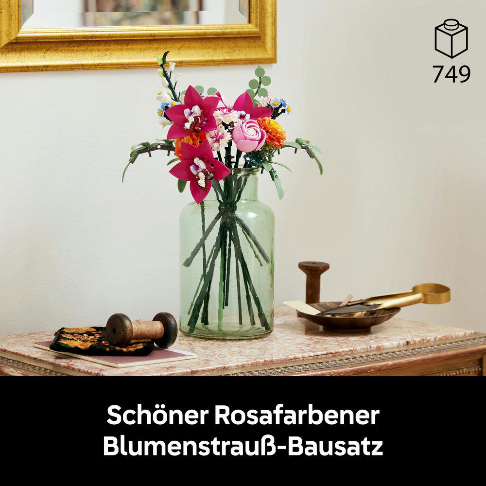 Ein Lego-Set eines schönen Blumenstraußes in einer grünen Vase. Rosa, orange und gelbe Farben.