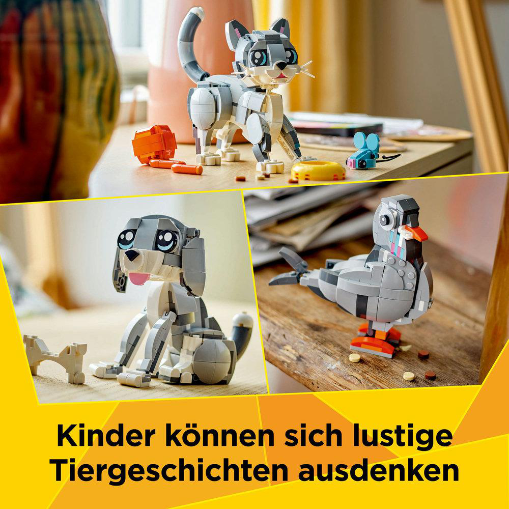 Drei Lego Tiermodelle: Katze, Hund und Vogel. Graue Katze mit Zubehör. Hunde- und Vogelmodelle werden gezeigt.