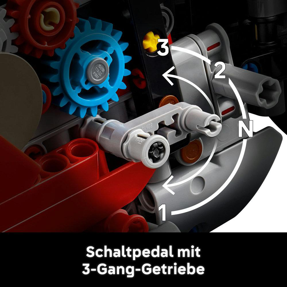 Getriebebaugruppendetail. Graue und blaue Zahnräder mit Pfeilen, die den Gangwechsel anzeigen.