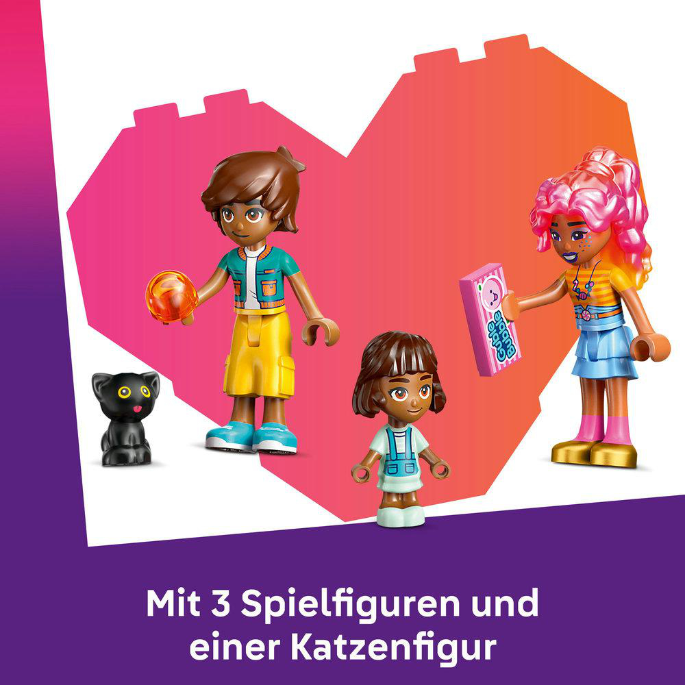 LEGO Friends Set mit 3 Mini-Puppen und einer schwarzen Katzenfigur auf rosa Herzform.