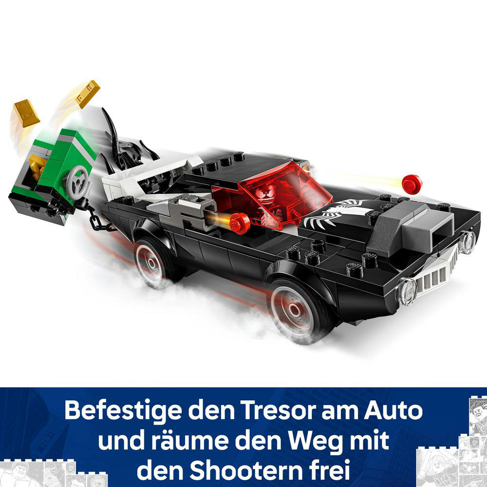 Lego-Schwarzauto mit befestigtem grünem Tresor und roter Kugel, die aus dem Auto abgefeuert wird.