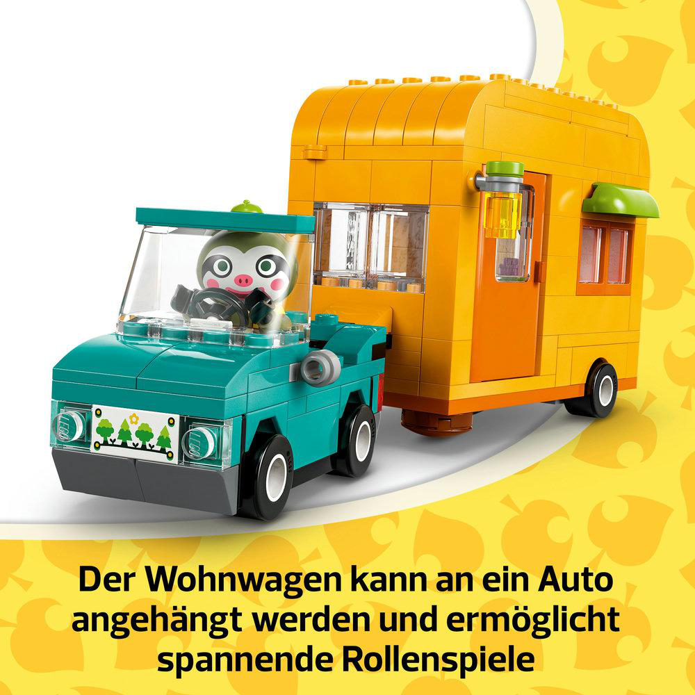 Ein Lego-Spielzeugauto mit Anhänger, mit einem niedlichen Faultier-Fahrer.