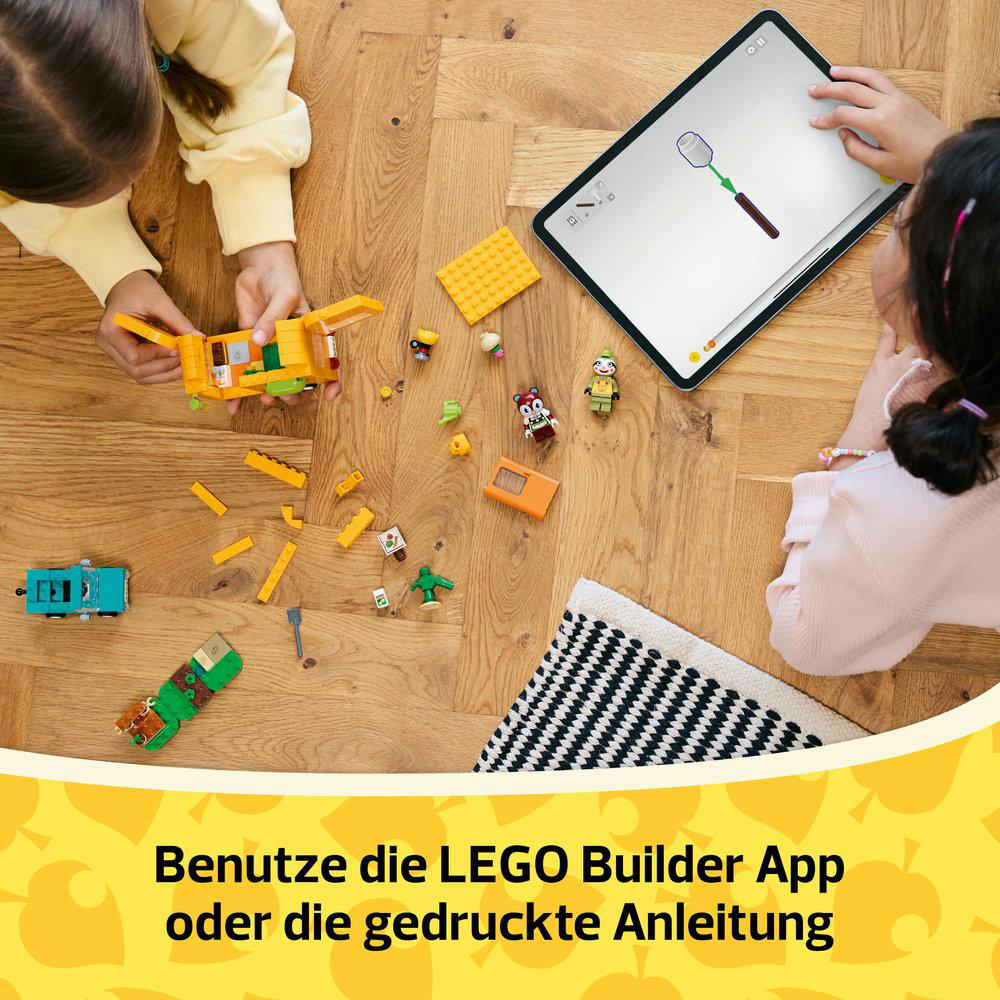 Zwei Kinder, die die Lego Builder App oder gedruckte Anleitungen verwenden.