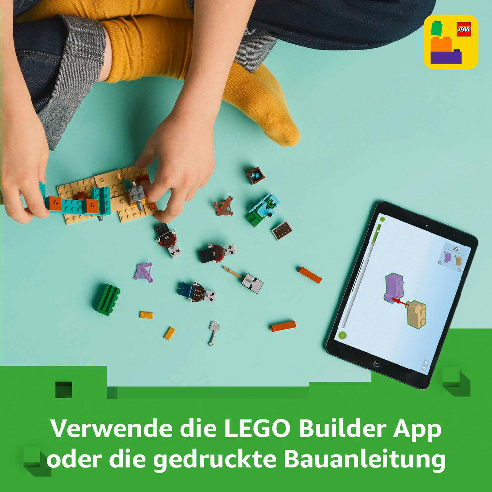 Kind benutzt ein Tablet mit Lego-Anweisungen auf dem Bildschirm.