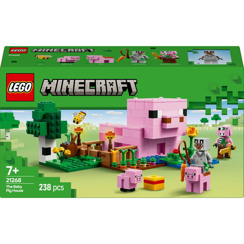 Lego Minecraft Box-Set. Rosa Schweinehaus, Figuren und grüner Hintergrund.