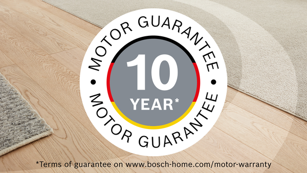 'MOTOR GUARANTEE' ve '10 YEAR*' yazan, bir halı üzerinde motor garantisi logosu.